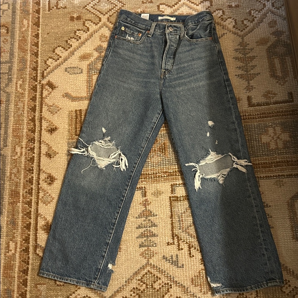 Distressed Blue Jeans